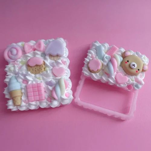 Handmade kawaii decoden phone case for Samsung Galaxy Z Flip decorated with pastel whipped cream, cute bear, sweets, and candy charms