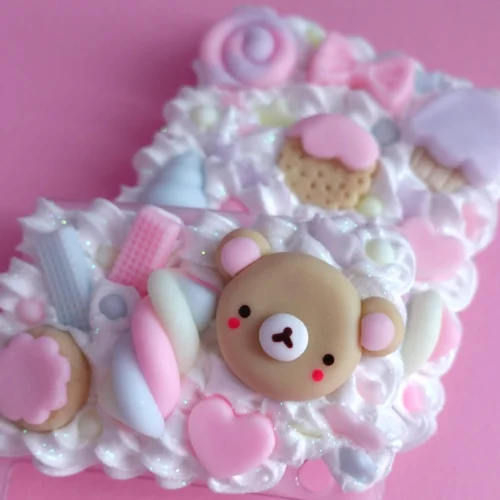 Handmade kawaii decoden phone case for Samsung Galaxy Z Flip decorated with pastel whipped cream, cute bear, sweets, and candy charms